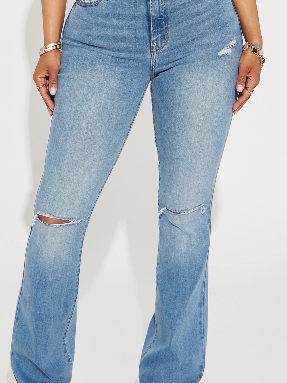 Fashion Nova Light Blue High-Rise Flare Jeans with Knee Rips